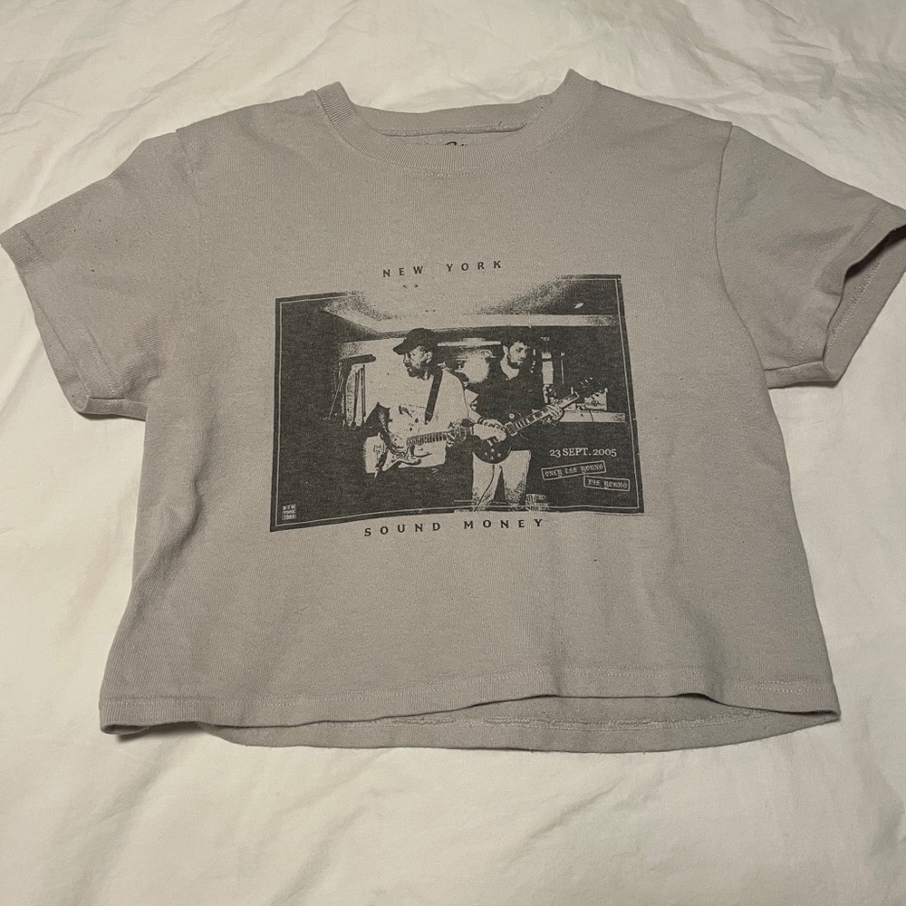 Brandy Melville “New York Sound Money” baby T